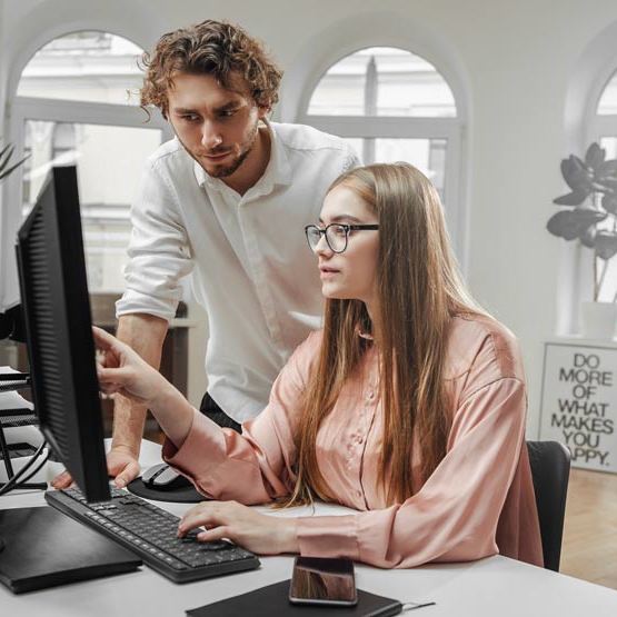 Caucasian Colleagues Works In Illuminated Office R S6 W58 Cy