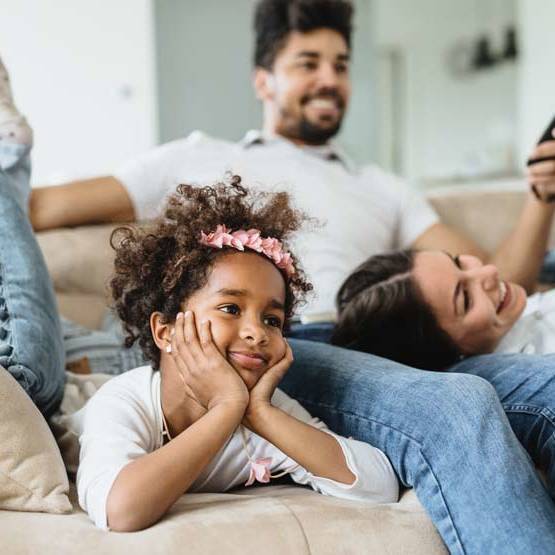 Family Watches Movie While Sitting On The Couch 5 Swg3 Rd